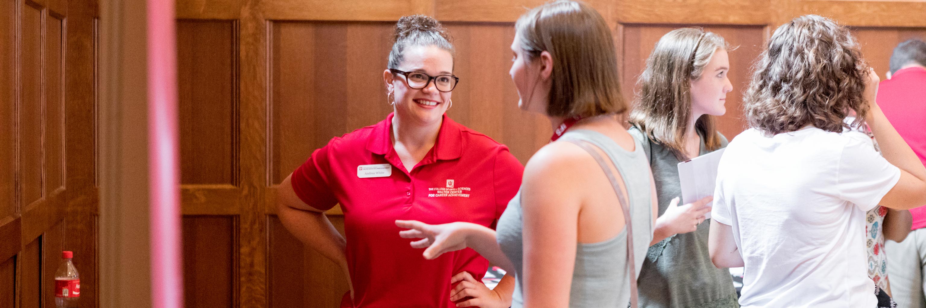 A student speaking with a career adviser 