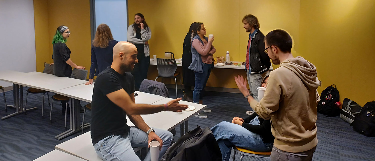 Students converse in La Tertulia