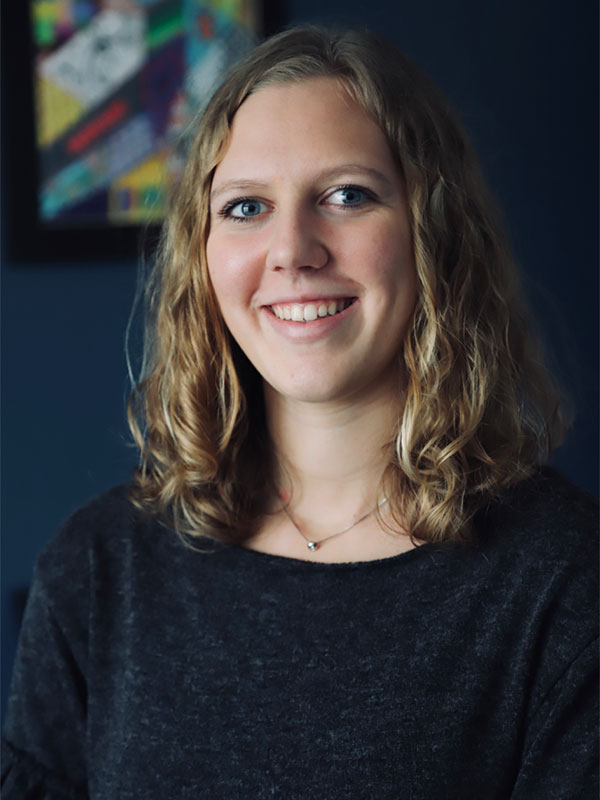 A headshot of Giada Mirelli, who wears a black sweater.